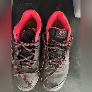 .Pink & black under armour softball cleats size 2